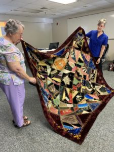 Appraiser with crazy quilt